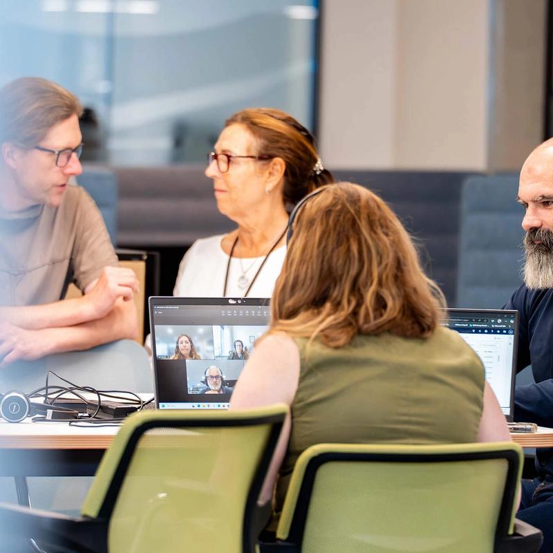 Teams collaborating on projects in the C5 Office